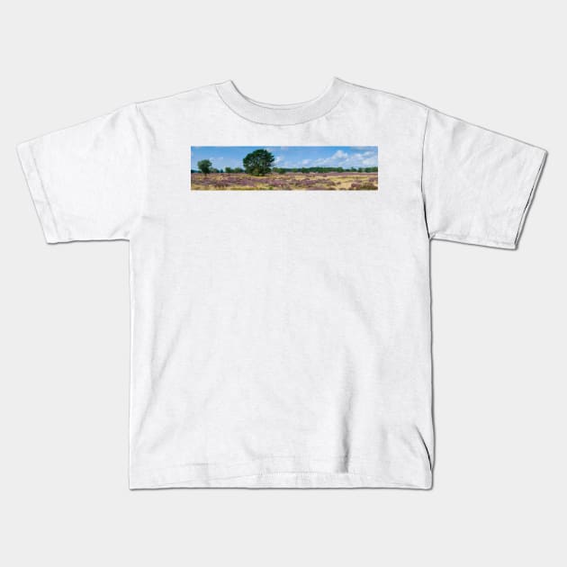 Panorama of heathland with trees early in the morning Kids T-Shirt by Dolfilms